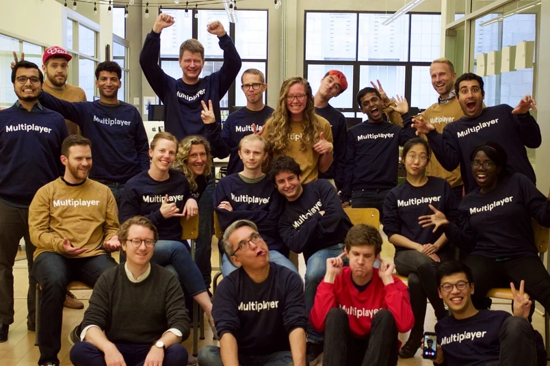 Figma team members in a photograph published in the company's history